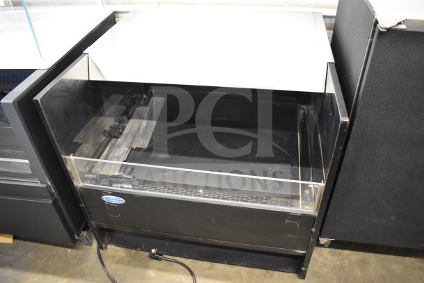 Federal Commercial Horizontal Grab N Go Merchandiser with clear display, black frame, and Federal logo. Signs of use visible.