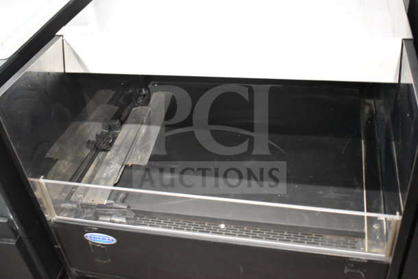 Federal Commercial Horizontal Grab N Go Merchandiser with clear display, metal shelves, and a "Federal" label, in used condition.