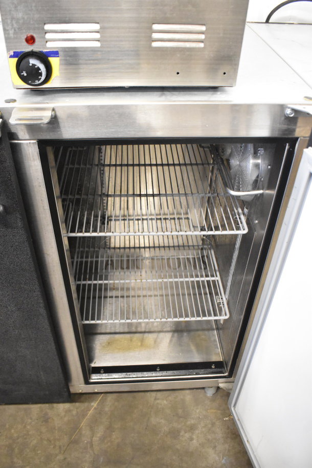 Glastender ND72-R1-BN 3 Door Back Bar Cooler, open showing shelves, stainless steel exterior, 115 Volts, 1 Phase.