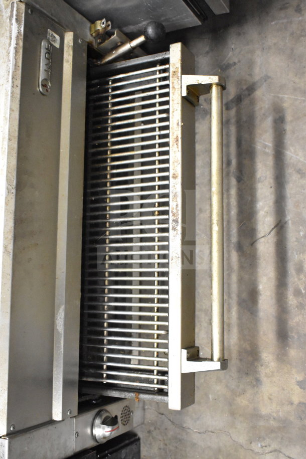 Jade gas-powered commercial cheese melter with vertical grill, metal handle, and visible control knob; used condition.