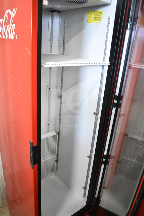 Imbera VR09 commercial single door cooler, 115 volts, red exterior, adjustable shelving, clean interior, label with usage warning.