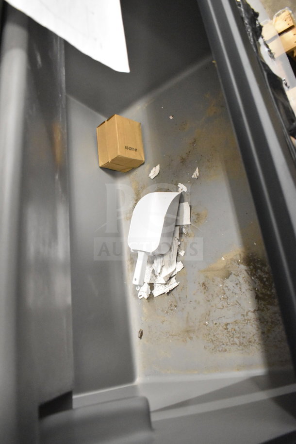 Brand new 2026 Scotsman B948S 48" ice bin, shows scratch and dent wear. Includes scoop and box, holds 893 lbs.