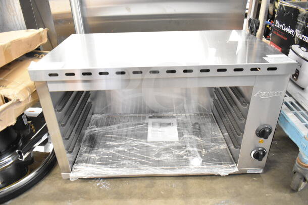 Brand new Avantco 177CHSME32IM 32" electric countertop cheese melter. Minor scratches, 208/240 Volts.