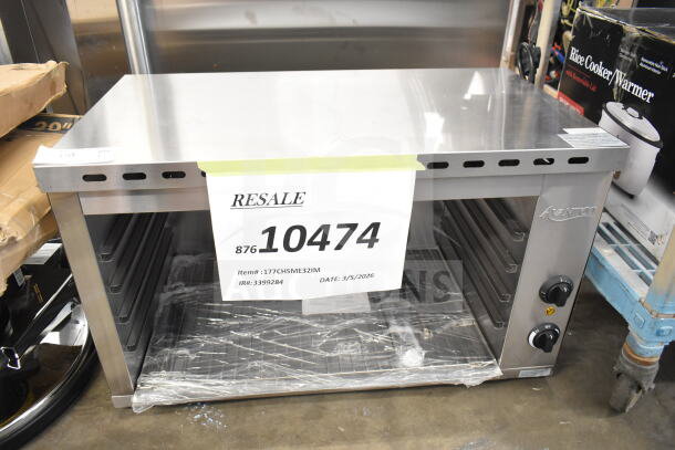 Brand new Avantco 177CHSME32IM 32" electric cheese melter, 208/240V, visible resale tag, minor scratches and dents.