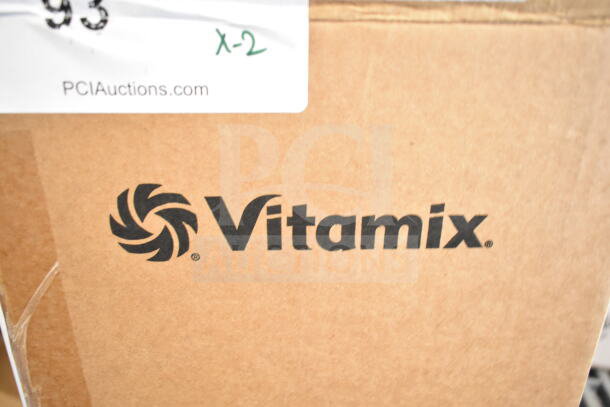 Cardboard box with Vitamix logo, labeled as containing brand new scratch and dent Vitamix 60047 Advance 32 oz. blender jar.