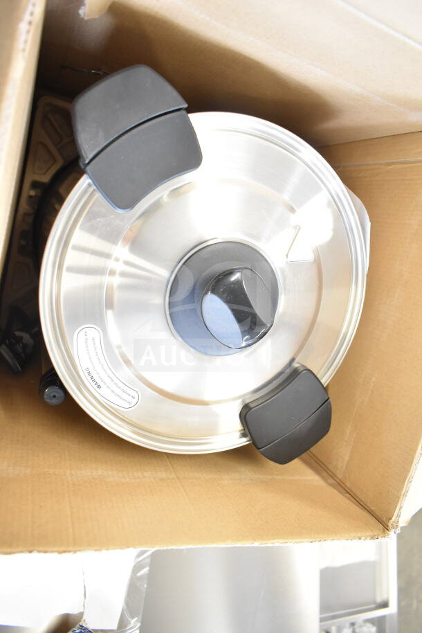 "Brand new Avantco 177CU65ETL 65 Cup stainless steel coffee urn in box. Scratch and dent condition with labels visible."