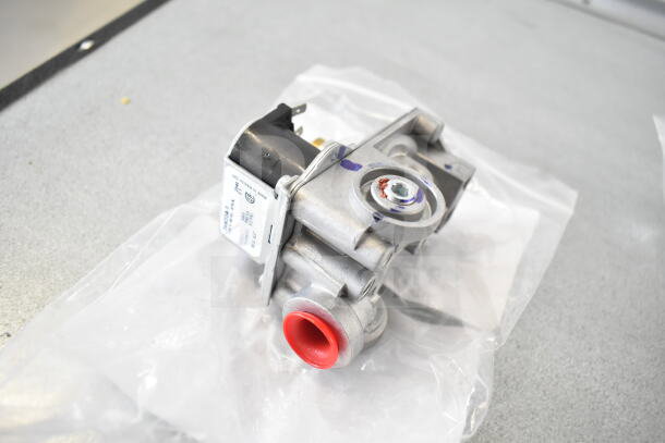 Brand new Moffat M234458 gas valve in packaging. Silver with attached label, indicating specifications.