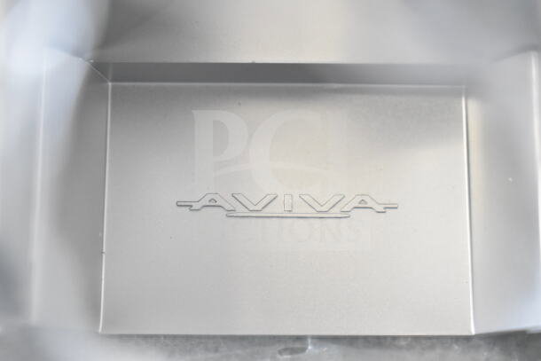 Aviva 30 oz. satin silver 3-chamber wall mounted locking soap dispenser, brand new condition, embossed with "AVIVA".