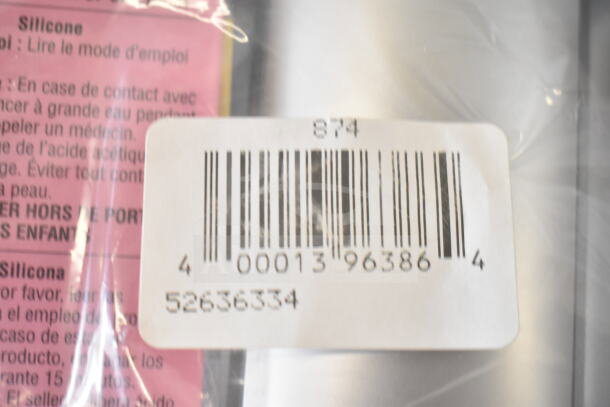 Barcoded packaging showing labels in multiple languages, part of auction items including Zumex shredder disc and more.