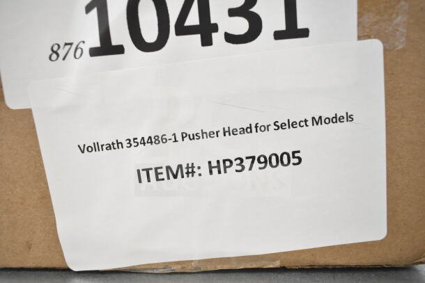 Cardboard box labeled "Vollrath 354486-1 Pusher Head for Select Models," item #HP379005.
