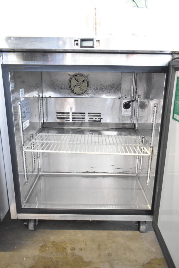 Turbo Air MUF-28 commercial undercounter freezer, single door, 115V, 1 phase, clean interior, metal finish, cooling fan visible.