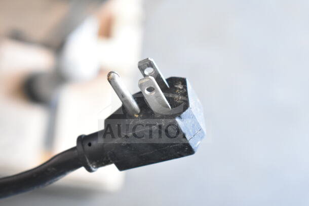 Close-up of a three-prong power plug for Turbo Air MUF-28 commercial undercounter freezer, 115 Volts, 1 Phase.