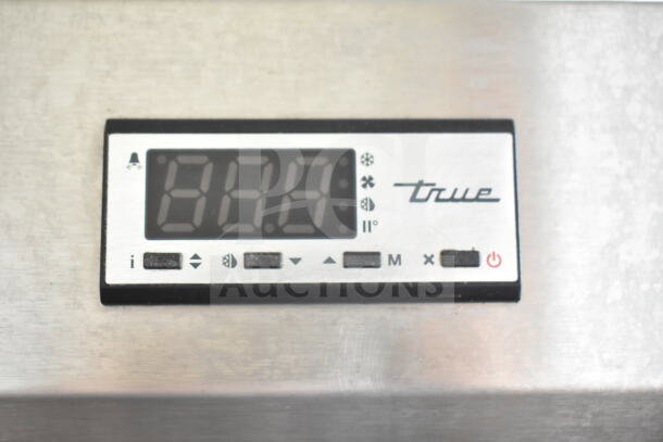 Digital display panel of a 2021 True STG1F-2HSLH-HC Commercial Freezer, showing controls and temperature readout.