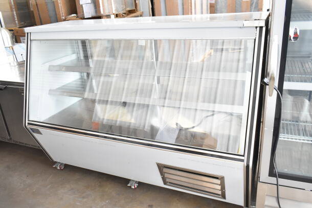 Optimum HD-72 deli display case, floor style, glass front, 120V, 1 phase, excellent condition, ideal for commercial use.