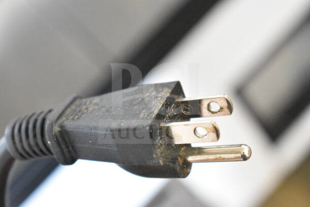 Optimum HD-72 commercial deli display case plug, showing 120V, 1 phase connection. Slight wear visible on prongs.