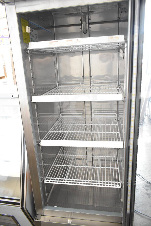 Kool-it KB27RG single door reach-in cooler on commercial casters, four adjustable shelves, stainless steel interior, excellent condition.