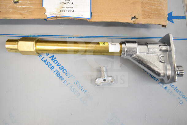 Brand new Watts 12" wall hydrant, minor scratches and dents, model HY-420-12, sturdy brass and steel construction.