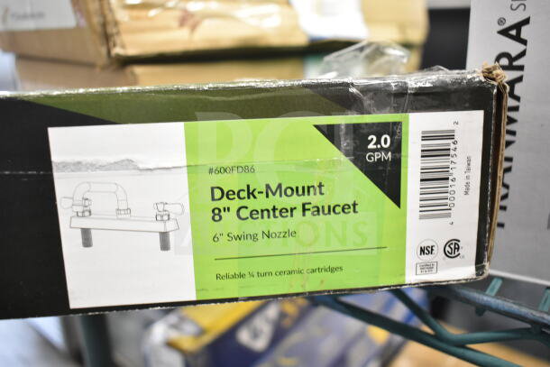 Brand new Regency 600FD86 deck-mounted faucet with 8" centers and 6" swing spout in original packaging. 2.0 GPM flow rate.