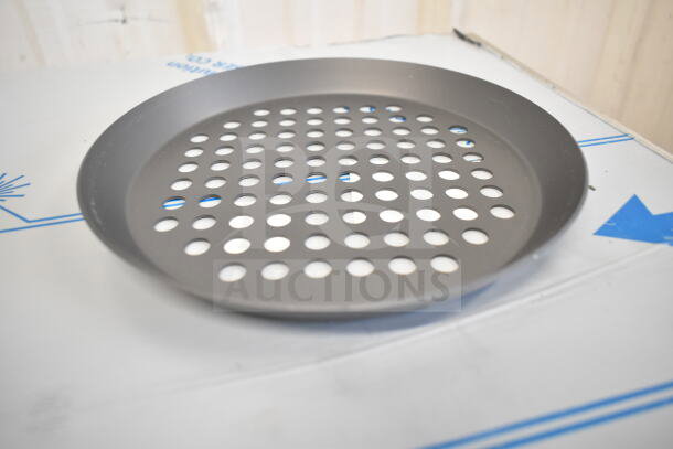 Box of 12 Vollrath PC08XPHC 8" perforated aluminum pizza pans, new with minor scratches, hard coat anodized.
