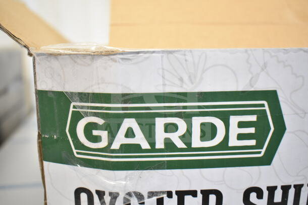 "Brand new Garde 181OYSTSHUK Specialty Oyster Shucker in packaging, labeled 'scratch and dent' condition."