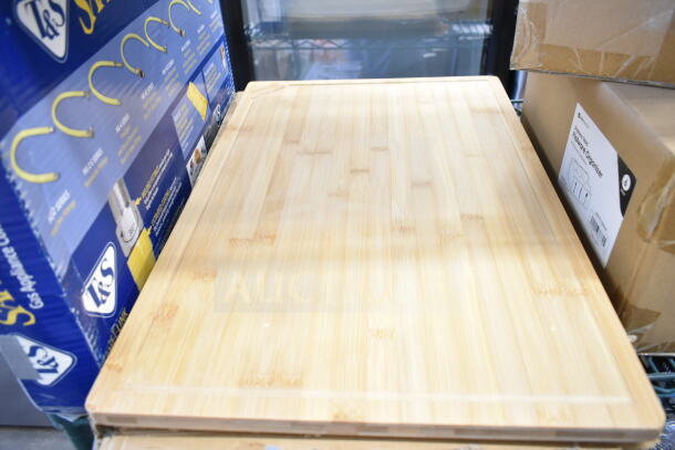 Brand new wood cutting board, 16"x24", light finish, scratch and dent condition, auction for 3 times your bid.