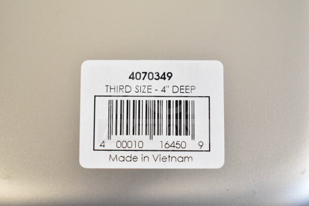 Label on Choice 4070349 steam table pan, third size, 4" deep, made in Vietnam. Bar code visible.