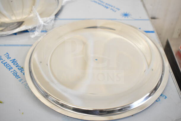 Brand new stainless steel plate, minor scratches. Auction includes 17 scratch and dent items, like collar forms and bowls.
