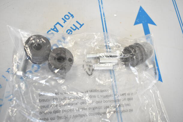 Clear plastic bag containing motor components; bolts and washers visible. Labeled for BRAND NEW SCRATCH AND DENT PSD135XW-H3EUN Motor.