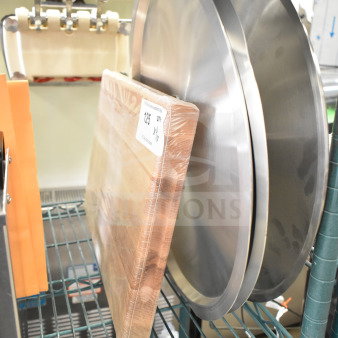 Brand new Boos Block Cutting Board and two Choice 471SPC70 aluminum pot/pan covers on shelf; see tag for details.
