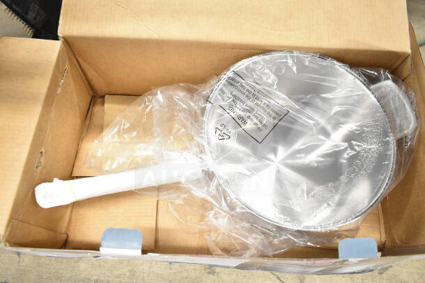 Brand new 473SSAUCP10 Vigor SS1 Series 10 Qt. stainless steel sauce pan in box, aluminum-clad bottom, clear warning label.