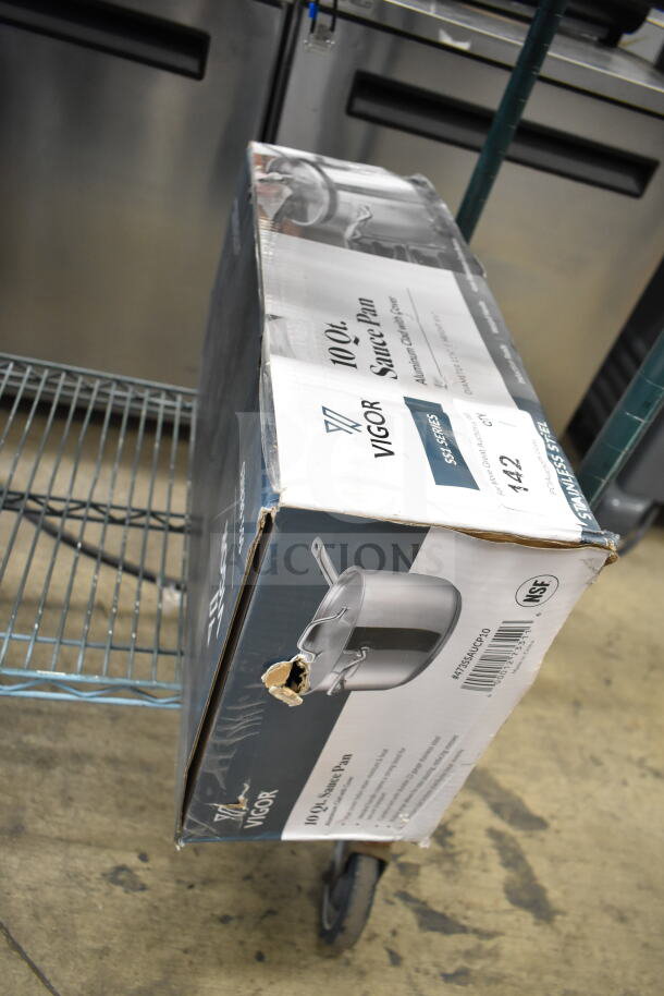 Brand new Vigor SS1 Series 10 Qt. stainless steel saucepan with aluminum-clad bottom and cover, scratch and dent condition.