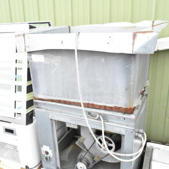 Commercial floor style unit with exposed wiring and pulley system, moderate wear, visible rust, mounted on a pallet.