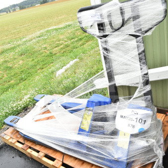Brand new Lavex manual pallet jack with 27" x 48" forks, 5,500 lb. capacity. Wrapped and labeled as MAY26-101.