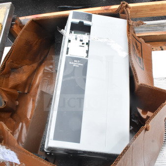 VLT Refrigeration Drive in a partially opened box, showing slight wear. Key features visible on front panel.