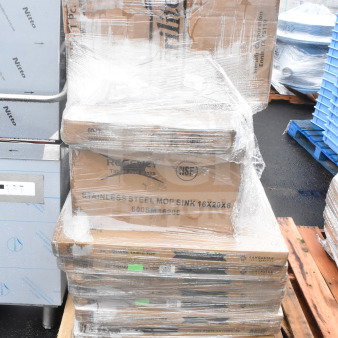 11 brand new scratch and dent items on pallet, including Regency stainless steel mop sink and Lancaster tabletop, shrink-wrapped.