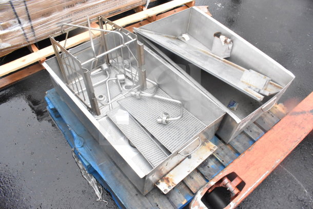 Two metal bins with industrial components and piping, set on pallets. Used condition. Auction includes two items per bid.