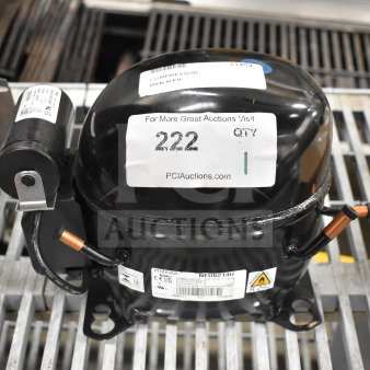BRAND NEW Embraco NEU6214U Motor, 115-127 Volts, 1 Phase. Scratch and dent condition. Labels indicate model and specs.