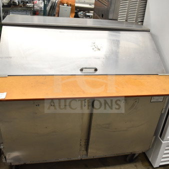 Beverage Air commercial sandwich salad prep table with Bain Marie mega top, on casters, 115 volts, 1 phase. Visible surface wear.