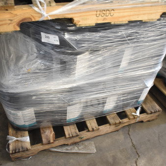 23 five-gallon barrels of ProGuard White 9101 Moisture Cure Liquid Rubber on pallets, wrapped in plastic.