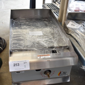 Brand new Cooking Performance Group 15" gas countertop griddle, model 351GTCPG15NL, with protective wrap and labeling.