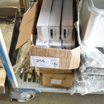 Cardboard box with new Arcoroc FL506 dessert spoons and Acopa Edgewood forks. Auction lot 255, marked "25 times your bid".