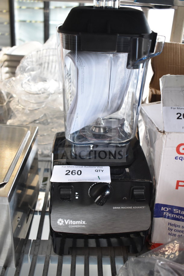 Brand new VitaMix VM0100A Drink Machine Advance, 2.3 hp, black blender with 48 oz. container, minor scratches, 120 volts.