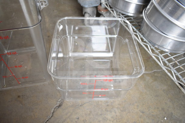 Clear 12-quart storage bins, brand new, slight scratches. Visible measurement markings in quarts and liters.