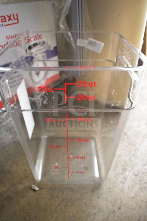 Brand new scratch and dent 22-quart bin, clear plastic with red volume markings, part of a 7-item bulk lot.