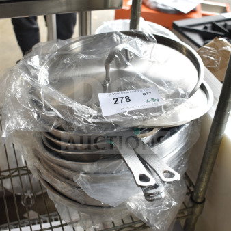 12 brand new stainless steel lids and aluminum fry pans, scratch and dent condition. Includes 473TPLCVR12 and 407FRYPAN.