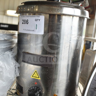 Brand new Avantco W300SS 6 Qt. stainless steel warmer, 120V, with minor scratches. Visible auction label "286 QTY 1".