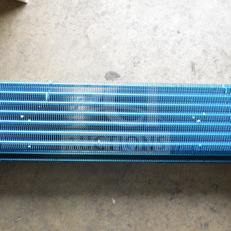 Brand new Avantco 17815283HC evaporator coil for A-23R Series with minor scratches and dents, featuring coiled copper tubing.