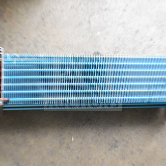 Brand new evaporator coil, model 17810622. Scratch and dent condition. Features metal fins and copper connections.