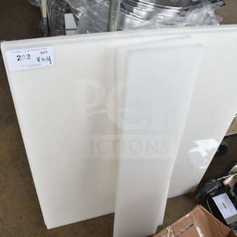Four brand new cutting boards, labeled "292 V x24," showing minor scratches and dents. Auction item offers 4x your bid.
