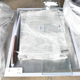 5 new Avantco glass doors for HDC-13 and RSD-71-HC cases, wrapped, with visible tags, placed on a shelf.